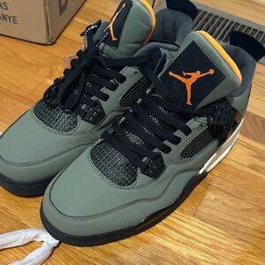 Air Jordan 4 Retro Sneakers in Green and Orange
